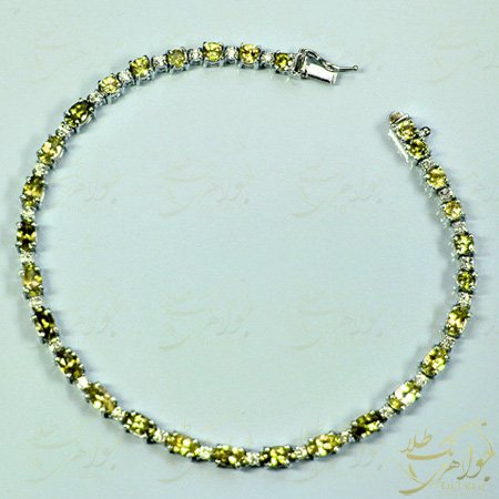 دستبند تنیس طلا و جواهر زنانه با نگین زبرجد