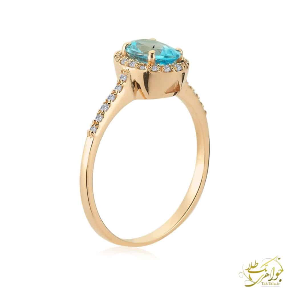 عکس انگشتر نگین بیضی توپاز آبی طلا زرد