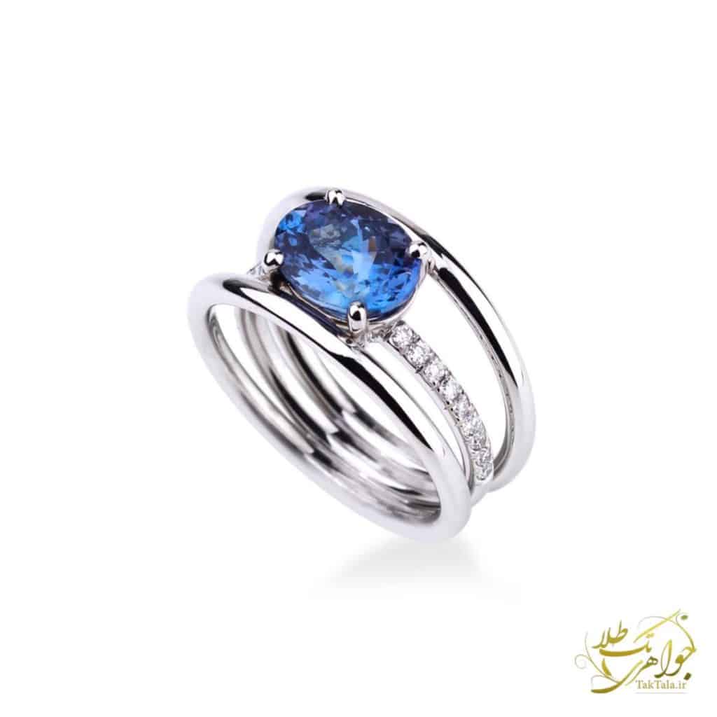 عکس جواهر زنانه لوکس با سنگ آبی تانزانایت تک طلا